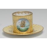 A Lynton porcelain coffee can and stand, painted by Stefan Nowacki, signed, with a Dutch man-of-