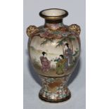A Japanese Satsuma ovoid vase, painted with geishas, the verso with flowers, pierced handles to