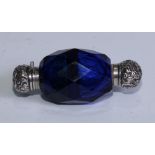 A 19th century silver colour metal-mounted blue glass double-ended faceted scent bottle, hinged