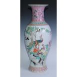 A large Chinese ovoid vase, painted in polychrome with peacocks, swallows and crows on a branch,