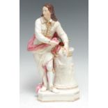 A Derby figure, Milton, he stands bare headed wearing traditional Puritan dress, removing his