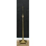 An early 20th century brass Corinthian column telescopic standard lamp, fluted pillar, stepped