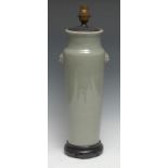 A Chinese pale celadon tapering cylinder vase, lion mask terminals, later fitted for electricity