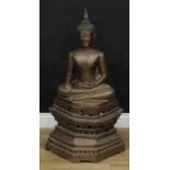 A large bronze Buddha Shakyamuni, pierced hexagonal stand, late 19th/early 20th century, 103cm high