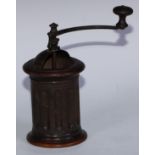 Treen - a 19th century coffee grinder, turned handle, fluted side, 23cm high