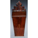 A George III mahogany candle box, shaped cresting, hinged cover, the front inlaid with an oval