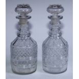 A pair of 19th century hobnail-cut glass decanters, star-cut mushroom stoppers, 22.5cm high