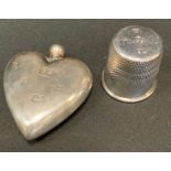 A silver heart shaped miniature hipflask, Birmingham 1993; a silver jubilee over sized thimble