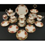 A Royal Albert Old Country Roses part tea service, comprising teapot milk jug, sugar bowl, cake