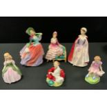 A Royal Doulton figure Sonia, Hn 1692; others Autumn Breezes Hn199; One Upon a Time, Hn 2047; Bess