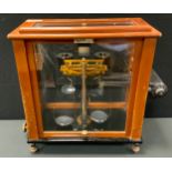 Scientific instuments - a set of cased 'Oertling' scientific/pharmaceutical balance scales, model