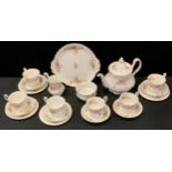 A Royal Albert`Moss Rose` pattern six setting tea service