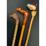 A Coppice Hazel walking stick, the finely carved pommel as the head of a male Pheasant, 123cm