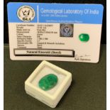 Loose Gemstones - a certified mixed cut oval emerald, 13.45ct, with GLI gem testing report card.
