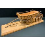 An early 20th century 1/8th scale model of a North Monmouth-shire farm wagon, 65cm long x 22.5cm