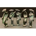 Japanese School - a set of five abstract cast iron figures dancing girls and musician, unsigned,