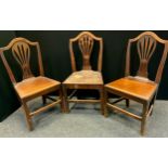 A pair of early 19th century oak and elm chairs, arched top, pierced vasular splat, square legs