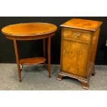 An Edwardian mahogany oval occasional table, boxwood stringing, 70cm high, 71cm wide, 50cm deep; a