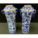 A pair of contemporary Chinese blue and white tapering vases, Elephant and ring loop handles, 41cm