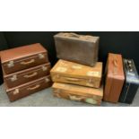 A set of three graduated Kazeto traveling suitcases, largest 22cm high, 64cm wide, 41cm deep; a pair