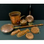 Kitchenalia - a 19th century shield boss egg pan; fish cake tins, shell; kettle; copper log