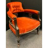 An early 20th century club elbow chair, 76.5cm high, 65cm wide, the seat 50cm wide and 47cm deep