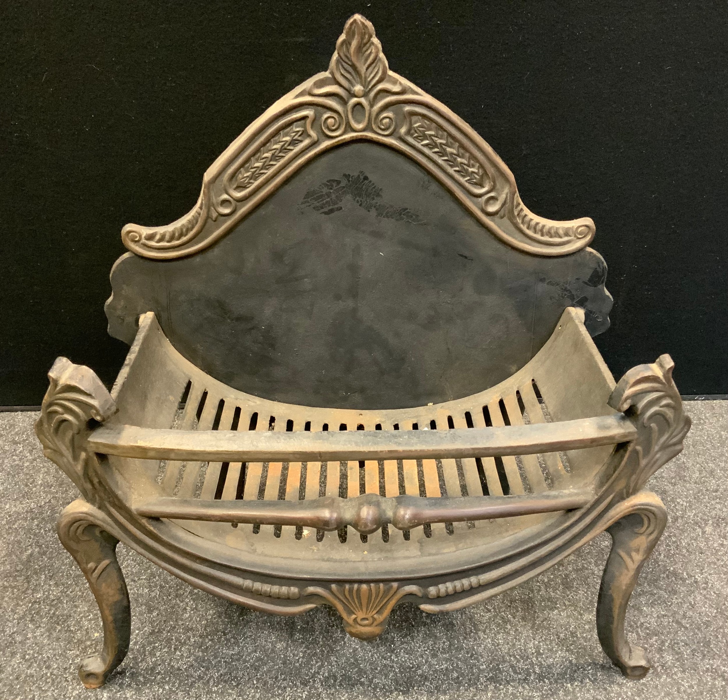 A 19th century style cast iron fire basket with fire back, 66.5cm tall x 65cm wide.