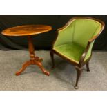 A late Victorian mahogany club chair, velvet upholstery; a Victorian mahogany tripod table, turned