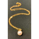 An 18ct gold cultured pearl pendent necklace.