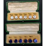 A set of six gold plated buttons, green tooled case; another set similar (2).