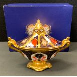 A Royal Crown Derby 1128 pattern two handled pedestal vase and cover, 13cm high, printed mark, boxed
