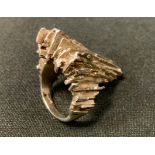 Peter Guy Watson - a modernist Brutalist design silver ring, textured top, plain tapering shank,