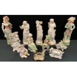 A pair of 19th century French painted porcelain figures, Aristocrat and companion; others parian;