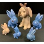 A Denby pottery rabbit, blue gloss, another Buff; others Sylvac Rabbits, Toothache dog (6)