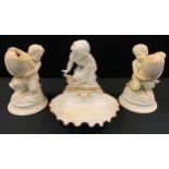 A 19th century Copeland figure and shell bowl, modelled as a girl knelling above scalloped bowl,