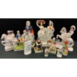 A 19th century Staffordshire figure Companions, others Cobbler and wife, Dandy with companion, spill