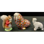 A Royal Crown Derby Walrus Paperweight, gold stopper; Beswick Beatrix Potter figure Timmy Tiptoes,
