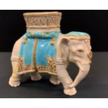 A Royal Worcester for Tiffany & Co elephant and howdah porcelain vase designed by James Hadley, with