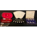 A set of six silver coffee spoons, Sheffield 1892, cased; a set of six teaspoons, London 1919;
