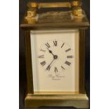 A lacquered brass five glass carriage clock, swing handle, Perry Greaves, presentation plaque to