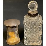 A smelling salts bottle with silver cover, Birmingham 1913; a silver mounted scent bottle (2)