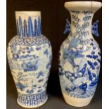 A large 19th century Chinese blue and white vase, 54cm high; another, 58cm high (a/f) (2)