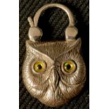 A silver and banded agate padlock pendant, as an owl