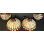 A pair of Tiffany style wall lights, applied with dragonflies, by Interiors 1900, 30cm x 22cm; a