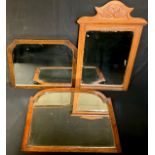 An arched rectangular mirror, 68cm x 56cm; an Edwardian mirror; etc (3)