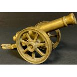 A brass desk cannon, with commemorative date for 1812