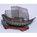 A Chinese silver coloured metal and enamel model, of a junk, hardwood stand, 21.5cm long