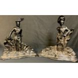 A pair of Victorian cast iron door stops, as Scottish Highland soldiers, 39cm high, c.1880