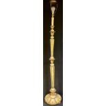 An early 20th century painted and parcel gilt standard lamp