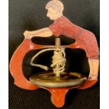 A late 19th/early 20th century tinplate gyroscope toy, Young Sportsman